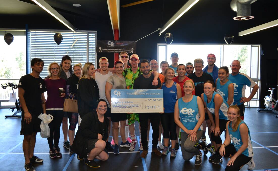 Big effort: Club Rivers staff hit the cycle studio for five hours straight last Saturday to raise funds for White Ribbon Australia.