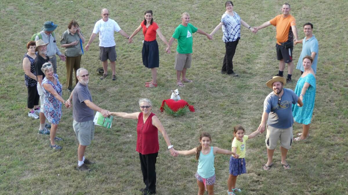 Have a heart: Residents gathered on the site of the Oatley Bowling Club on Sunday to send a message to Georges River Council.