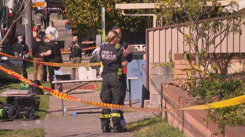 The scene at Kelsey Street, Arncliffe this morning following a raid by Australian Border Force officers. Picture: Nine
