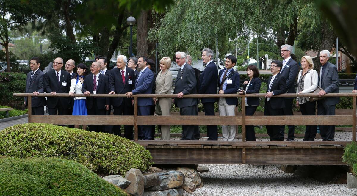 A friendship bridging the years: The delegation from Chuo City Council in Tokyo led by mayor Yoshihide Yada with Sutherland Shire Councillors in Chuo City Gardens at Sutherland. Pictures: John Veage