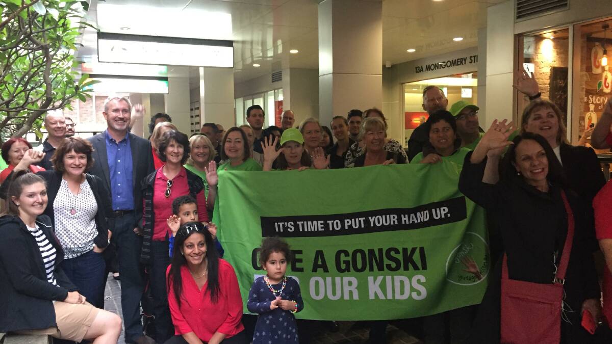 Supporting students: Teachers from St George schools rally outside office of Barton MP Nick Varvaris in Kogarah today over the refusal of the Coalition to implement the last two years of  Gonski funding.