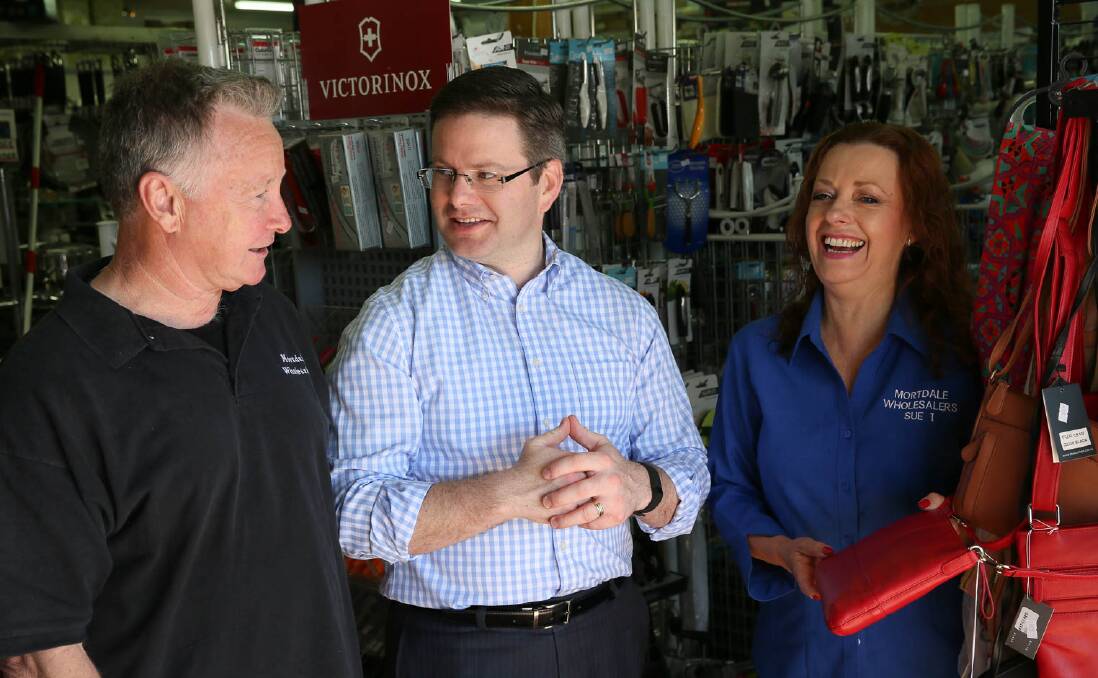  Oatley MP Mark Coure at Mortdale Wholesalers with staff Greg and Susan Young.