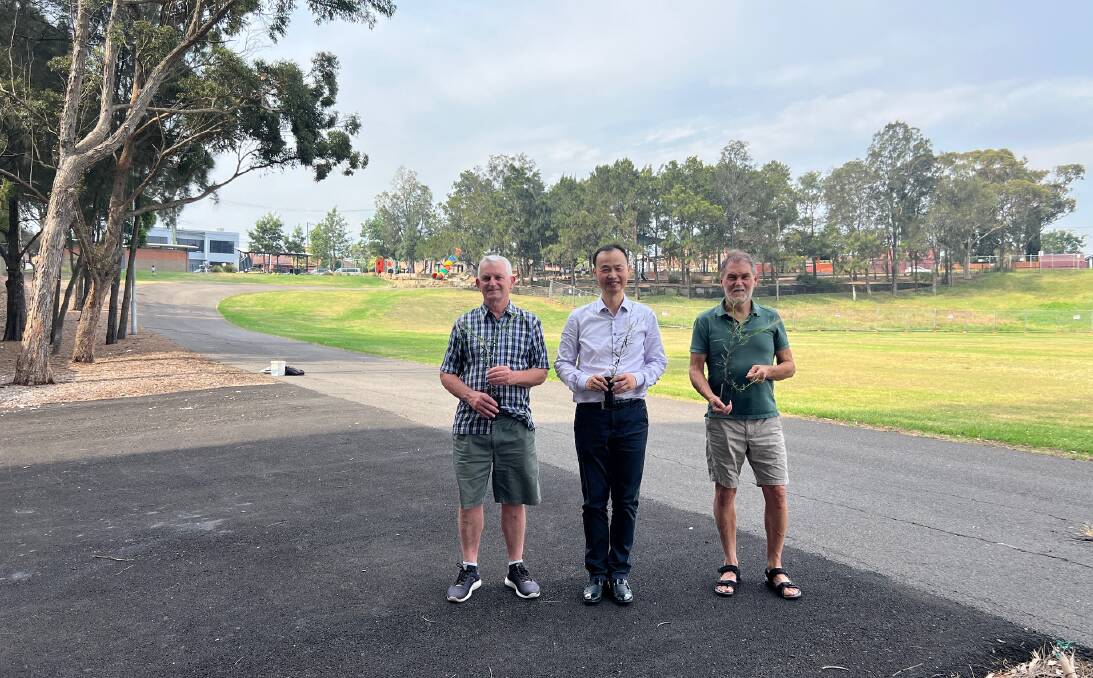 Georges River Councillors Peter Mahoney and Ben Wang with Adrian Polhill of the Oately Flora and Fauna Conservation Society at Kempt Field, Allawah.
