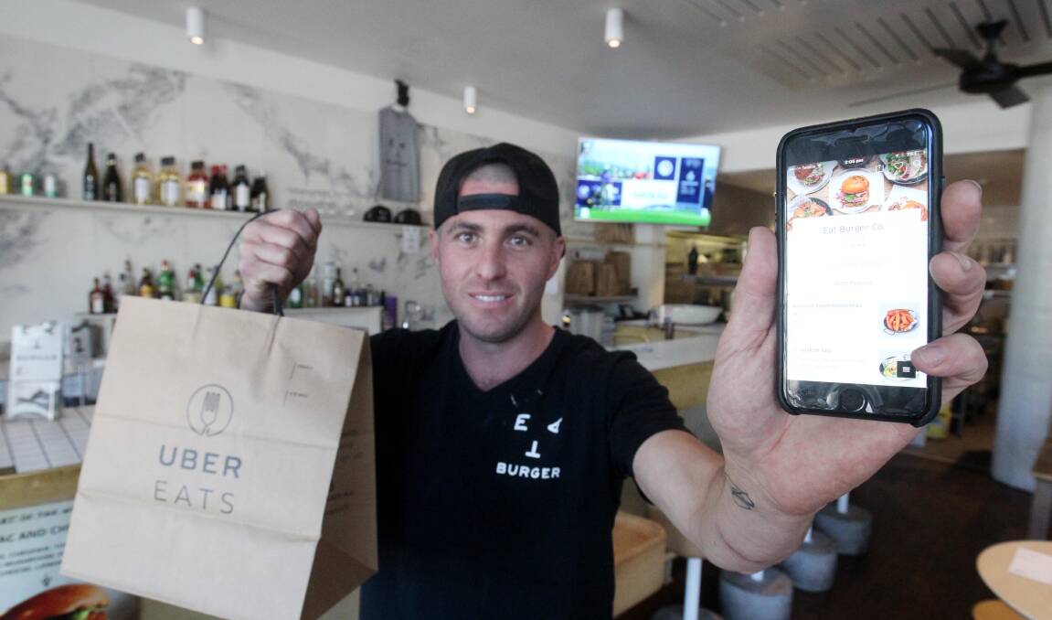 Game-changer: Paul Camilleri of Eat Burger Cronulla said the arrival of UberEATS in the shire will be a big boost for local business. Picture: Chris Lane