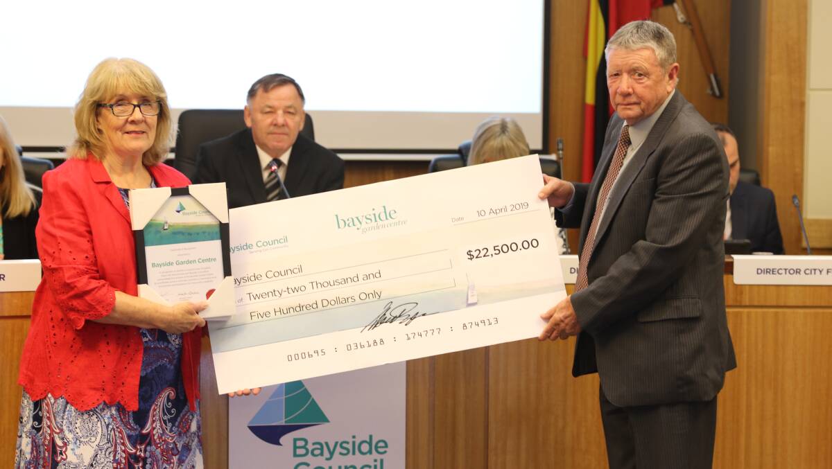 Seeding fund: Councillor Liz Barlow and Bayside Garden centre secretary Bill Dunn, with Bayside mayor Bill Saravinovski.