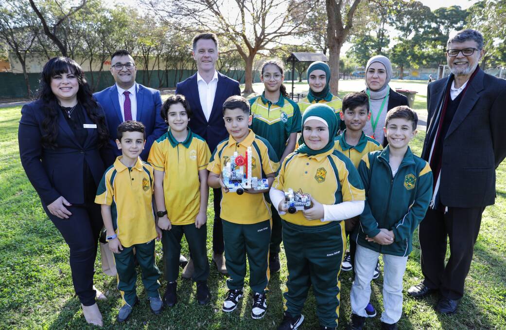 Team Arkana Australia show their robot to NSW Premier Chris Minns. They are taking the robot to the 2023 Universal Robotics Challenge (URC) World Final. Picture: John Veage