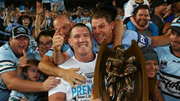 Leader: Paul Gallen is mobbed by Sharks fans after the NRL grand final. Photo: Getty Images