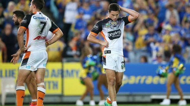 Tough to take: Mitchell Moses couldn't hide his disappointment at full-time after the Tigers went down 26-22. Photo: Mark Metcalfe