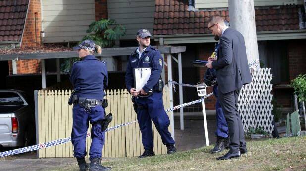 Police at a townhouse complex in Florida Street, Sylvania, where the body of a woman was found. Photo: John Veage