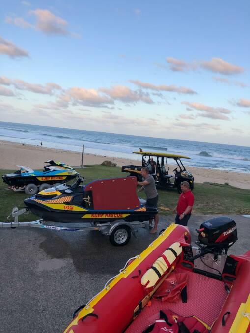 SEARCH: Surf Life Saving Illawarra crews return from a search at Figure Eight Pools on Monday. A missing 22-year-old has not yet been found. Picture: Surf Life Saving Illawarra