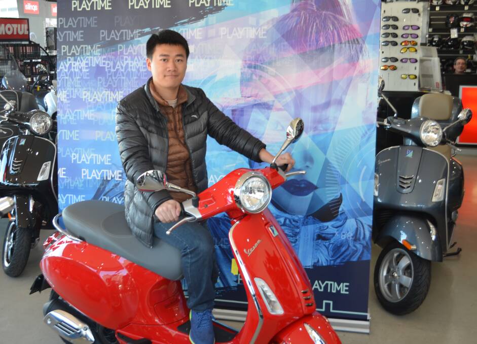 WINNER: Shenyao Guo takes home red Vespa at Playtime Miranda. Picture: Supplied