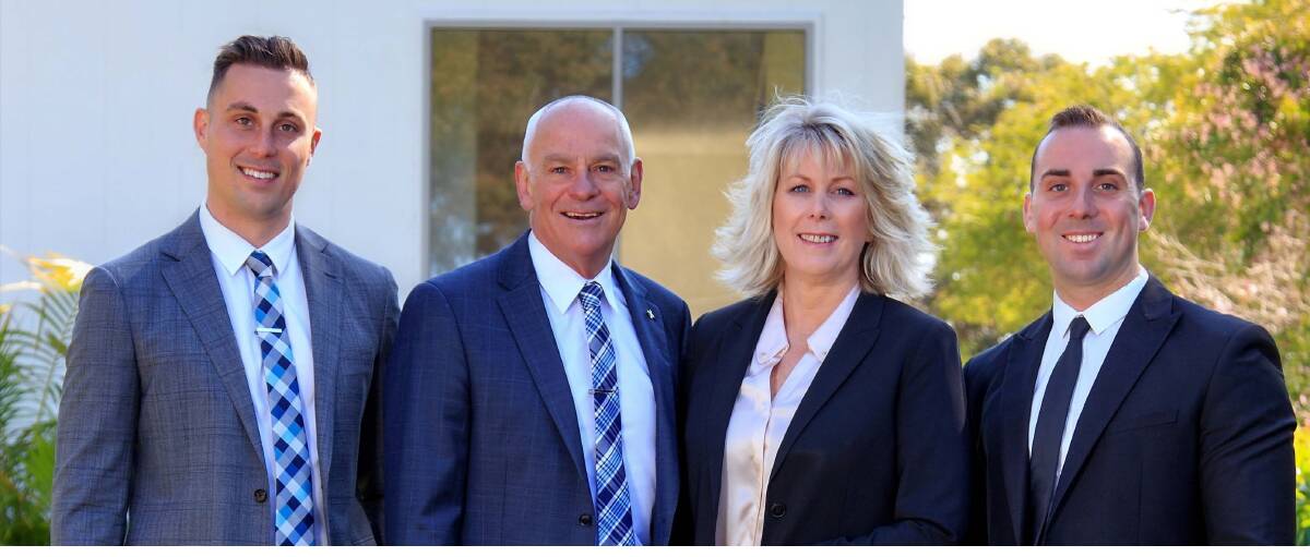 FAMILY AFFAIR: Peter and Michelle Green are pleased to have their sons, Michael and Stephen in the business with them. The entire Green family devote their time to the success of your real estate transaction. 