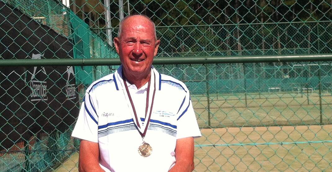 Glory: Alan Walsh with one of his three gold medals from at the Australian Seniors Team and Individual Championships. Picture: Supplied