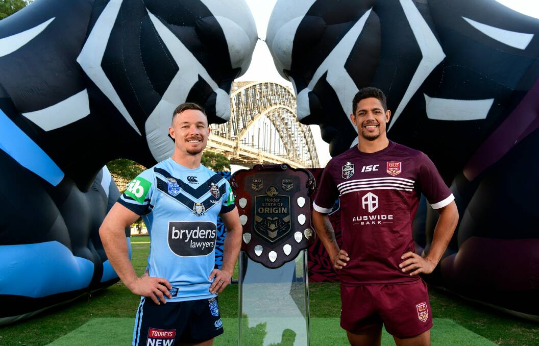 Origin launch: Damien Cook and Dane Gagai in the shadows of the Sydney Harbour Bridge on Wednesday. Picture: AAP