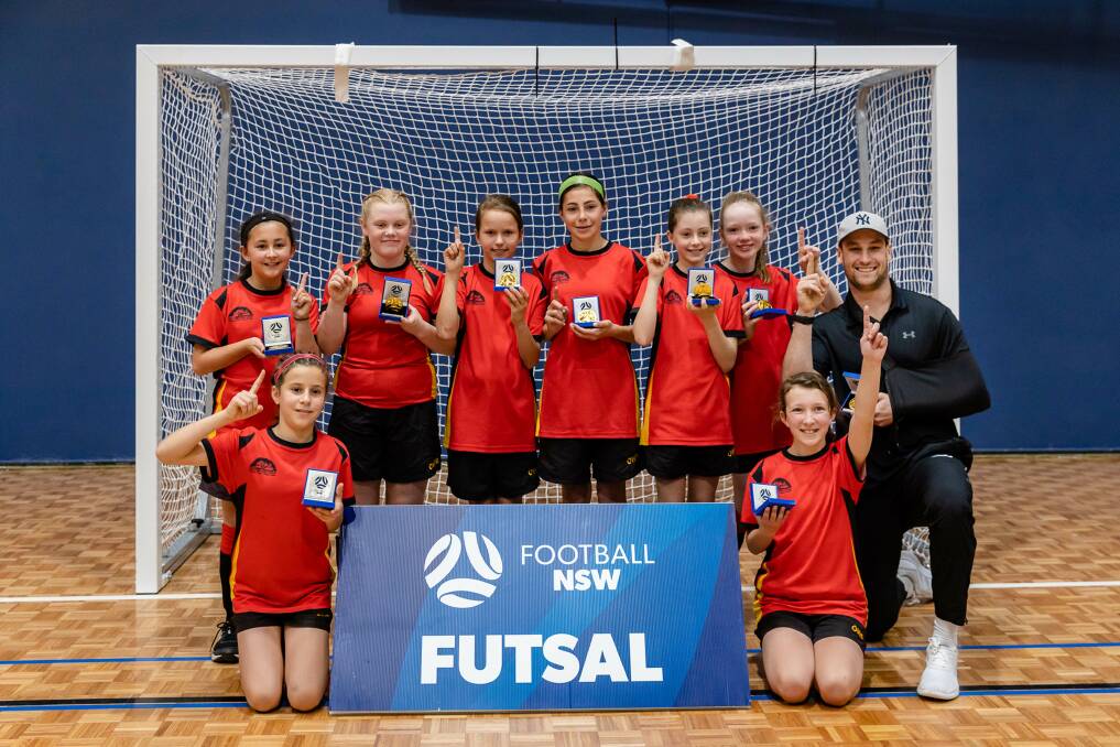 Champs: The Oatley West Futsal girls-Futsal is football that is played between two teams of five players, one of whom is the goalkeeper,with unlimited substitutions.