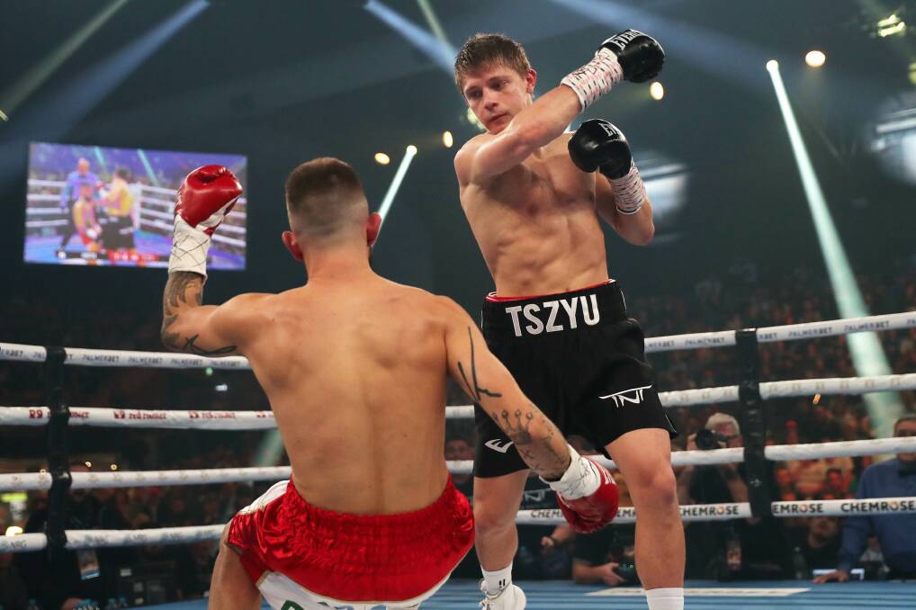 Gone: Young fighter Nikita Tszyu drops Mason Smith in the first round in their Newcastle 'Tszyucastle' battle on Wednesday night. Picture Peter Lorimer