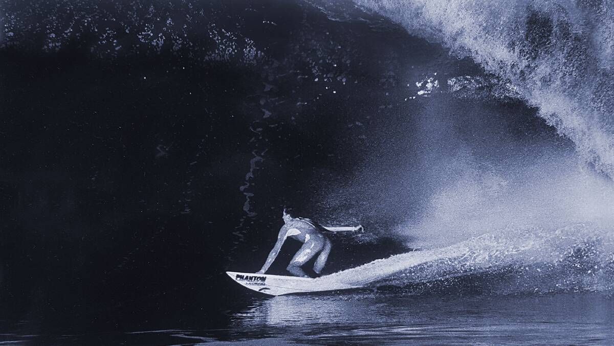 Fundraiser: Mark Rogers surfing his beloved Cronulla Point. Picture: Jack Eden