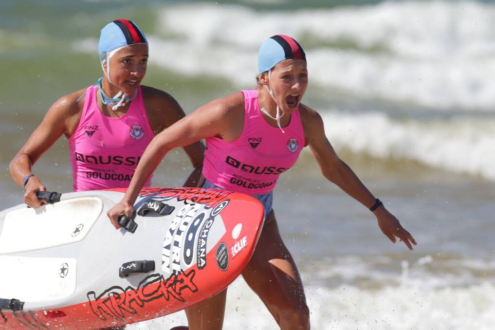 Success: The Wanda Surf Life Saving Club duo of Rome Southwell (front) and Jayda Zammit-Mayer, won the Under 14s and Under 15s Female Board Rescue at North Kirra Beach . Picture: John Veage.