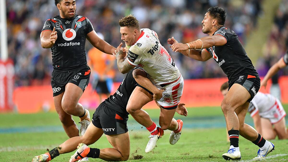 Wrapped up:Tariq Sims takes the line on during the Round 9 NRL match between the New Zealand Warriors and the St George Illawarra Dragons at Suncorp Stadium in Brisbane, Saturday, May 11, 2019. Picture AAP /Darren England