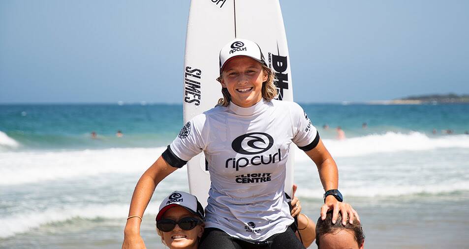  Molly Picklum gets chaired up the beach after winning the 2018 Australian GromSearch National Final at Wollongong.Picture Ethan Smith / Surfing NSW