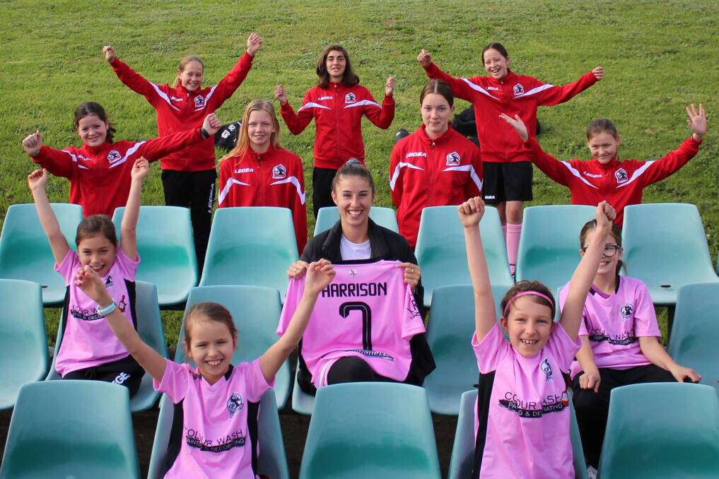 Celebration : Matilda Amy Harrison was presented with her own St George FC jersey at St George Stadium following a Saints' girls training session.