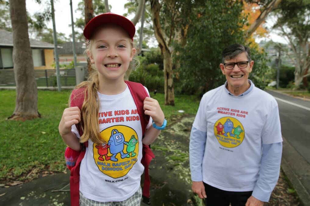 Walkers: Olympian Peter Hadfield and granddaughter Evie who goes to Grays Point Primary School.Picture John Veage