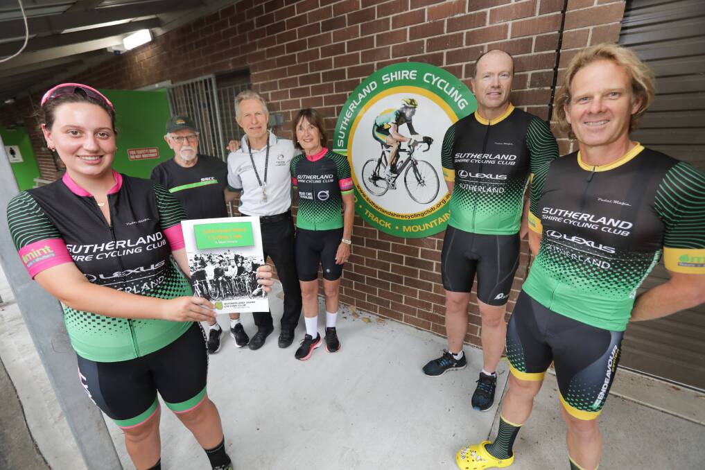 Members of the Sutherland Shire Cycling Club with the new book on the history of their club to be launched next weekend. Picture: John Veage
