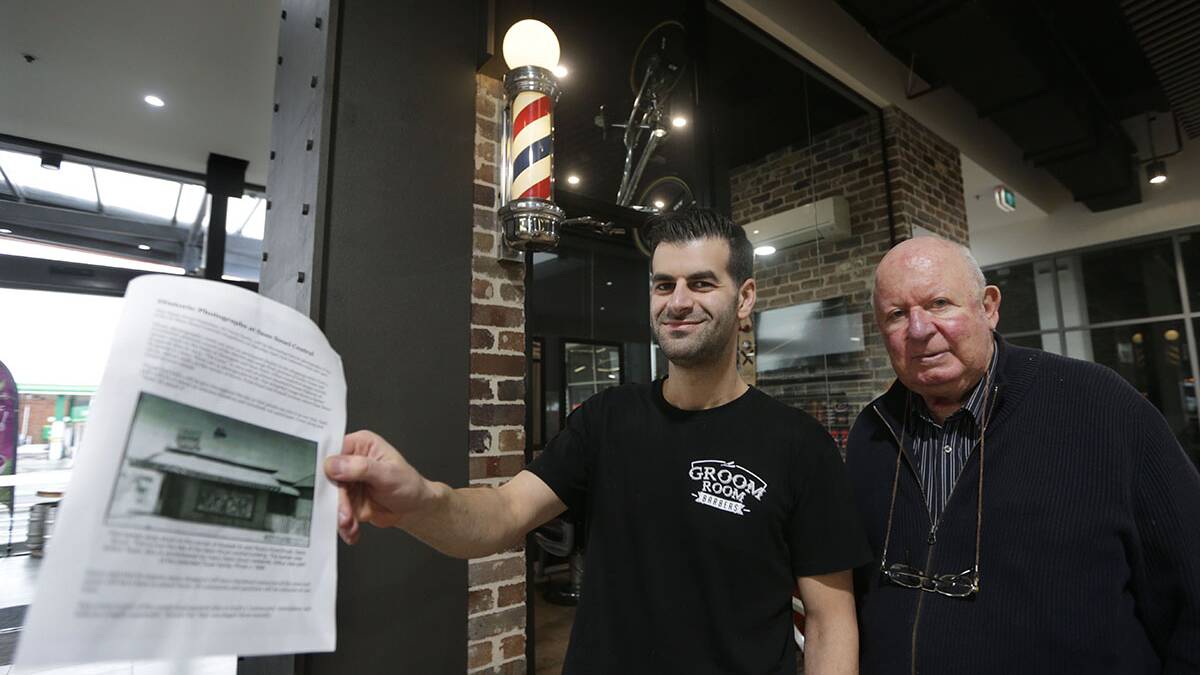 Still standing: Barber Sam Moustafa runs a Barber shop on the same historic site. Picture: John Veage
