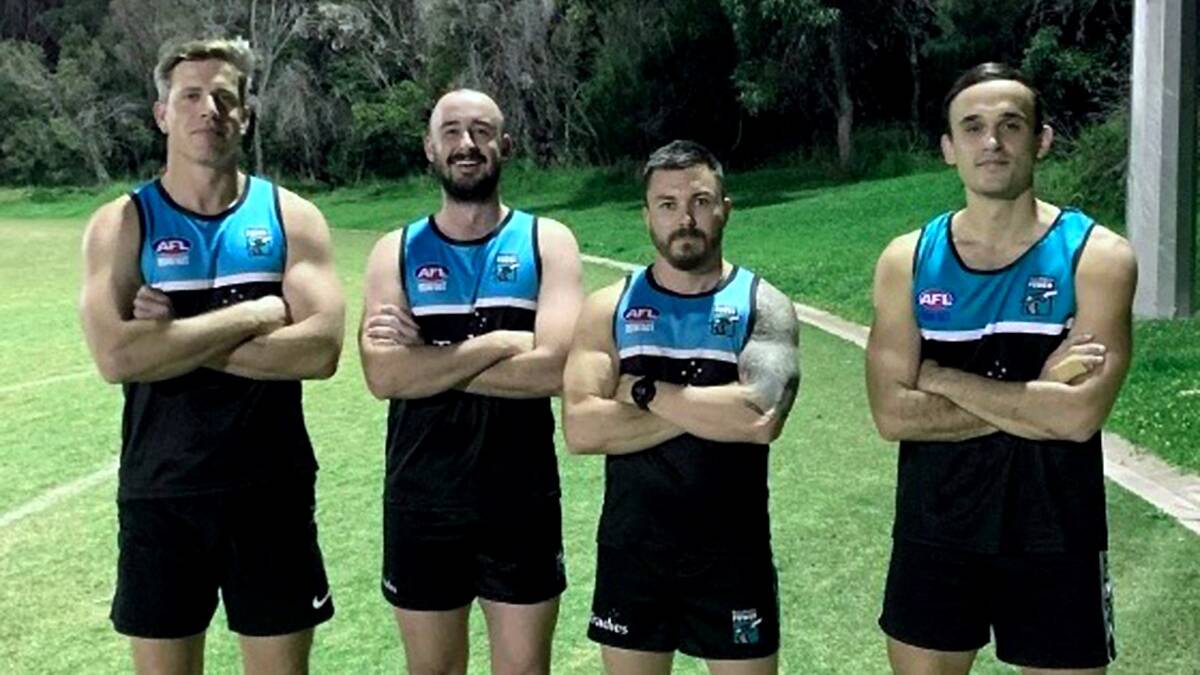 Black white and blue:Southern Power Seniors (left to right) Nick Salter, Brandon Mclean, Josh Preston (Coach) and Hayden Mclean at training this week.