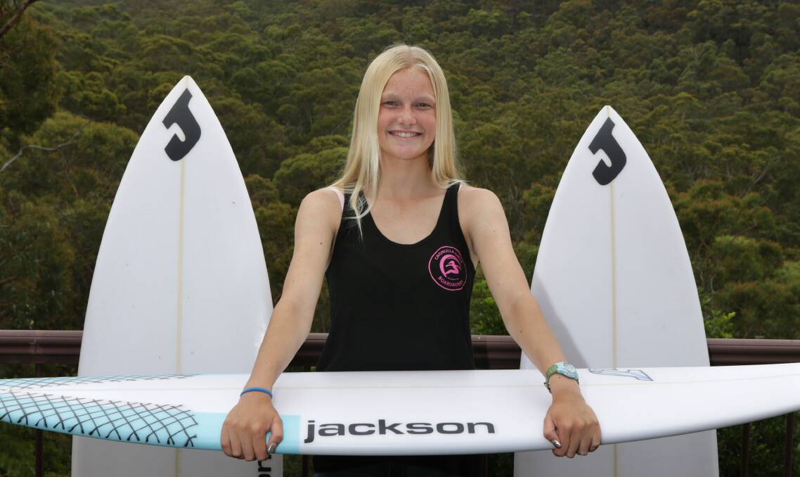 Girl power: Junior surfer April Davey is the 2018 Cronulla Girls Boardriders open champion. Picture: John Veage