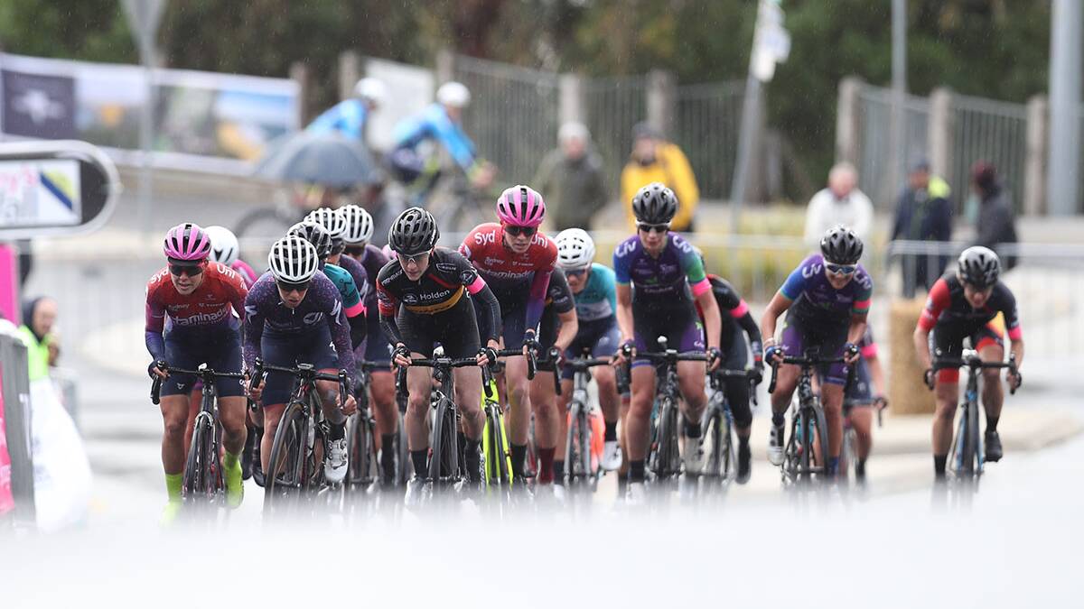 Hard Work: The peloton faced extremely harsh cold and wet conditions.Picture Con Chronis