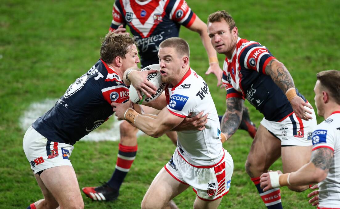 Fighter :The revitalized Dragons Matt Dufty was always a handful for the Roosters defence with a hand in two try's .Picture NRL Imagery