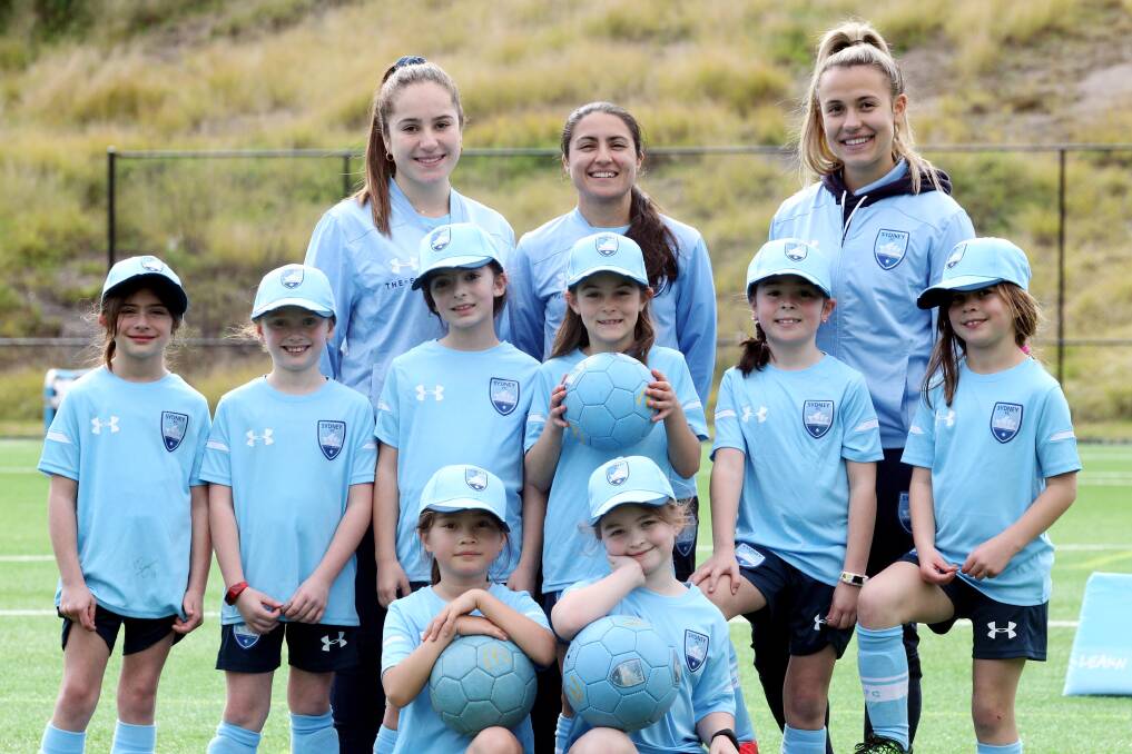 School holiday's: Sydney FC Westfield W-League players Julia Vignes, Teresa Polias and Angelique Hristodoulou helped out at a Peakhurst Park girls school holiday football clinic last week.Picture Chris lane