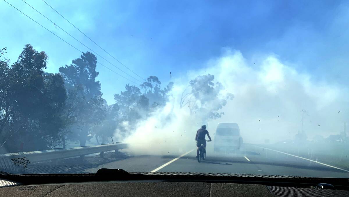 Smoke: Northbound traffic on the Princess Hwy was down to one lane whilst southbound was closed. Picture: John Veage