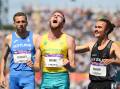 Gold medal: In one of the greatest runs in the nation's track history Caringbah's Ollie Hoare hit the headlines with his 1500m run in Birmingham. Picture Getty Images 