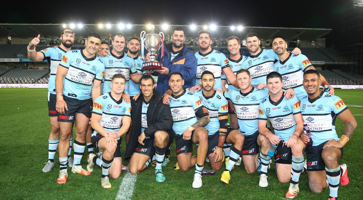 Celebrate:The Sharks finally bring the Steve Rogers Trophy back to the Shire with a dominate win over Manly.Picture NRL Imagery