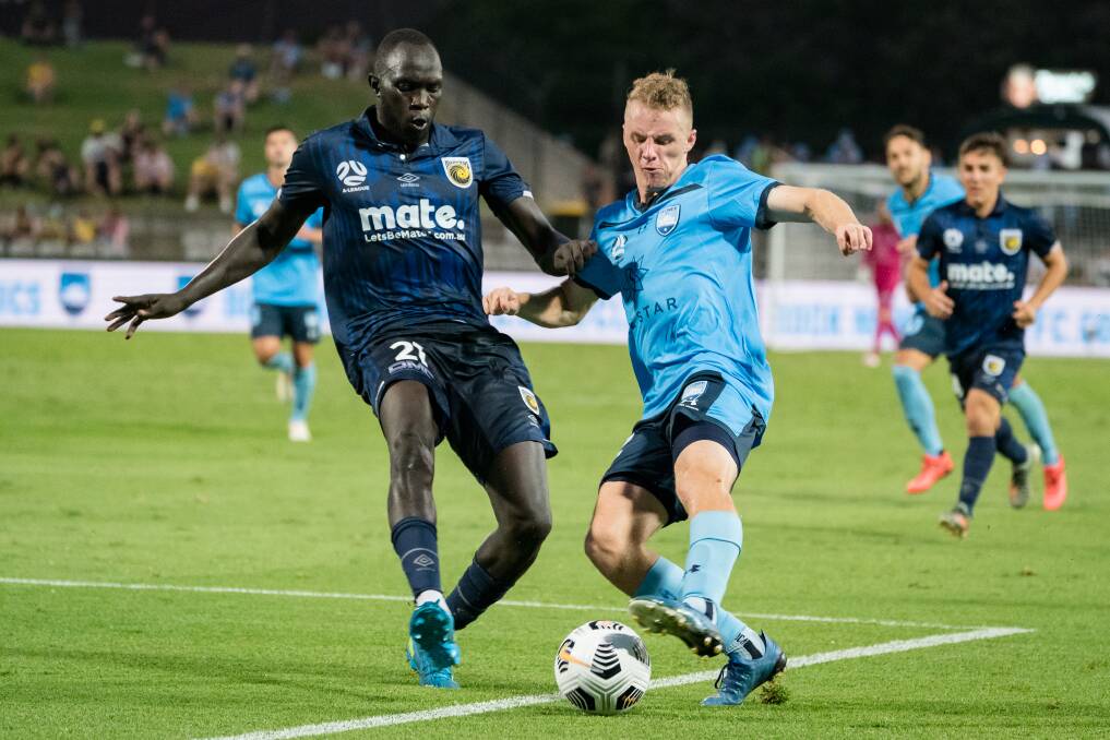 Hard work: Sydney FC was made to pay for their missed chances on Friday night at Kogarah's Netsrata Jubilee Oval. Picture: Jaime Castaneda