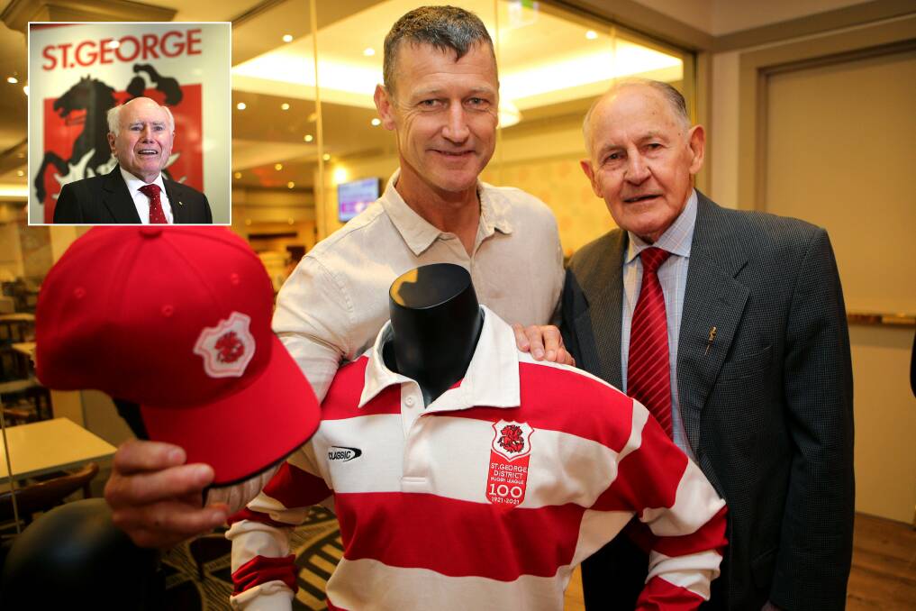 Dragons: Former players Brad Mackay, who played with St George, the Steelers and St George Illawarra, and 1962 premiership player John Riley celebrated with former PM John Howard. Picture: John Veage