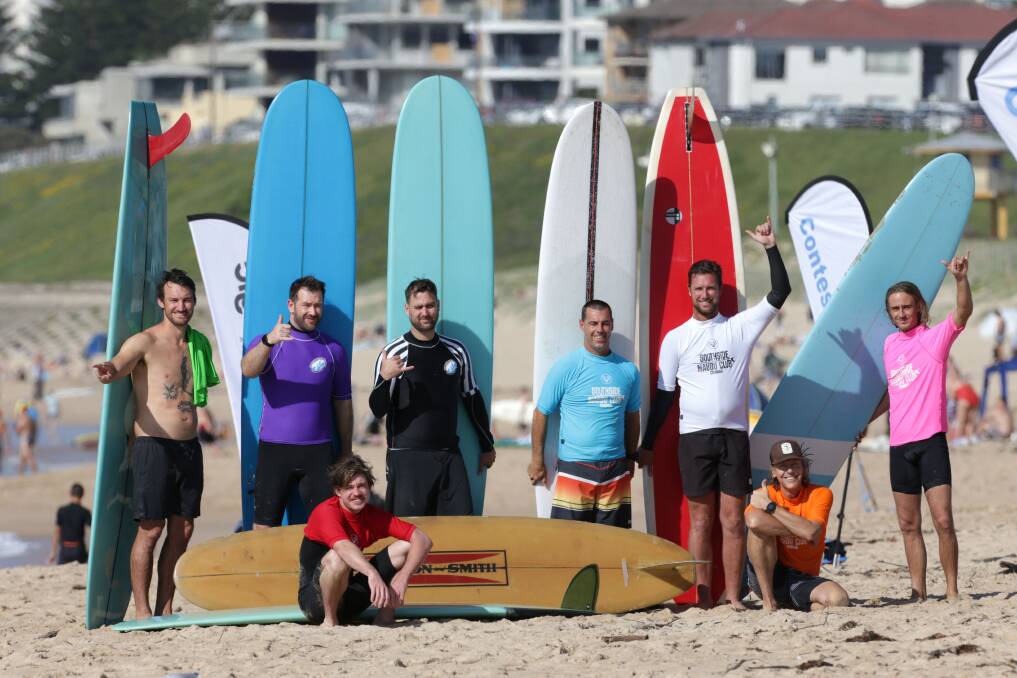 Inaugural: The 2020 Southside Malibu Club logger competitors line up before their historic final at Wanda Beach on Sunday. Picture: John Veage