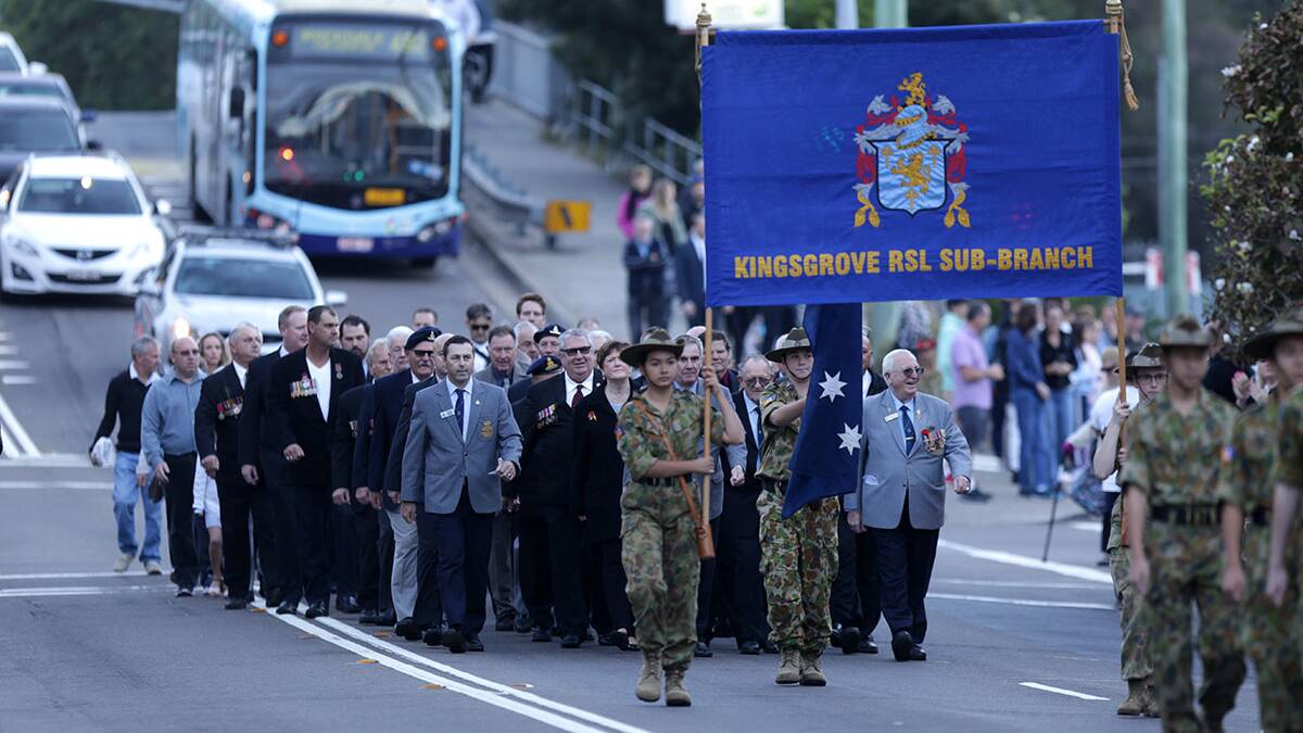 Hundreds gathered at Memorial Park outside the Kingsgrove RSL this morning for the Anzac Day service. Pictures: John Veage