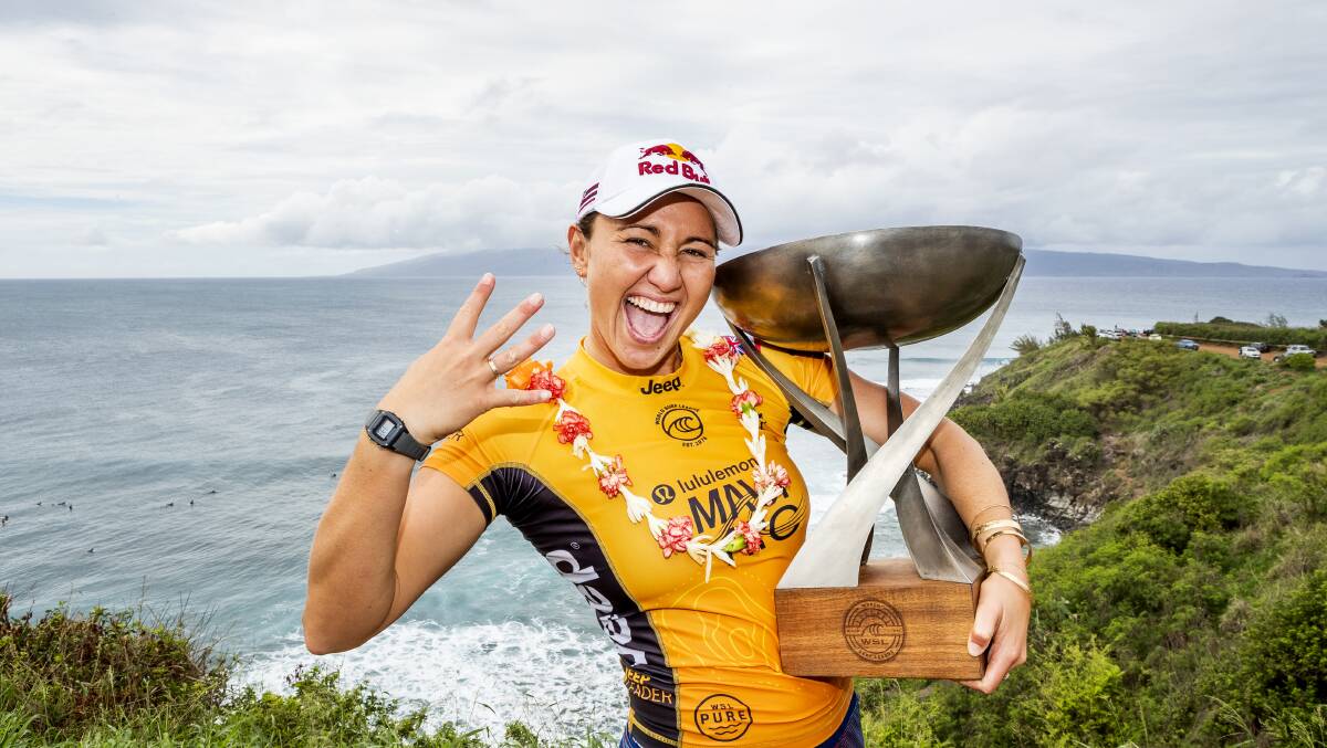 Hawaii's Carissa Moore celebrates her fourth World Title victory at the lululemon Maui Pro. Picture WSL / Cestari