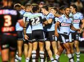 Try time: The Sharks celebrate in Tamworth with forward Braden Hamlin-Uele scoring against his former club in the second half. Picture NRL Images