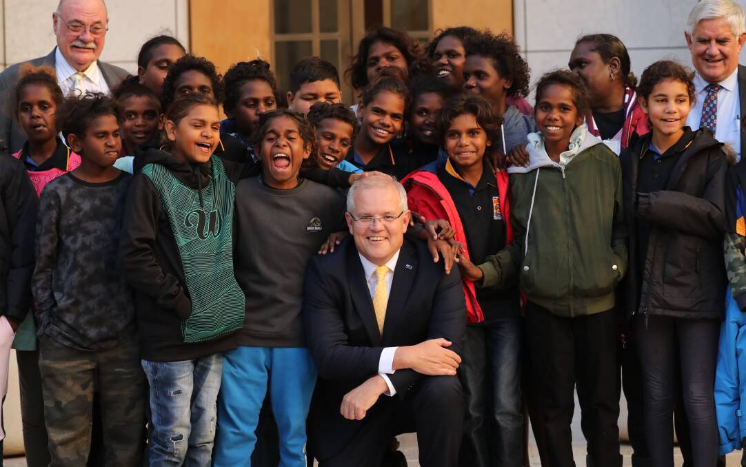 Top job: Students from Kowanyama meet the PM Scott Morrison in the Canberra Parliamentary courtyard. Picture: Adam Taylor