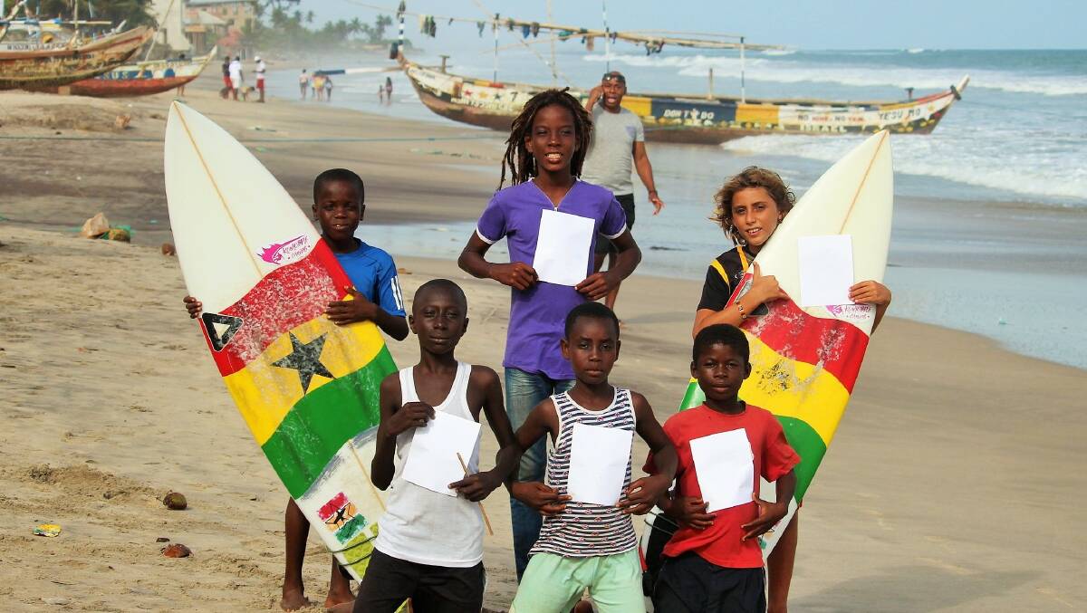 Young surfers in Ghana unite in celebration of International Day of Sport for Development and Peace to symbolize the peace and joy that Surfing has brought to their community. Photo: Mr. Brights Surf Shop