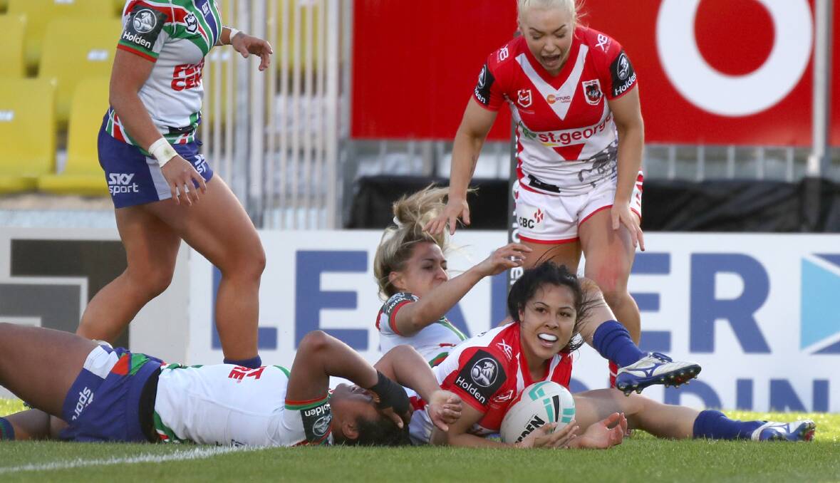 Try: Tiana Penitani celebrates for the Dragons. Picture: NRL Photos