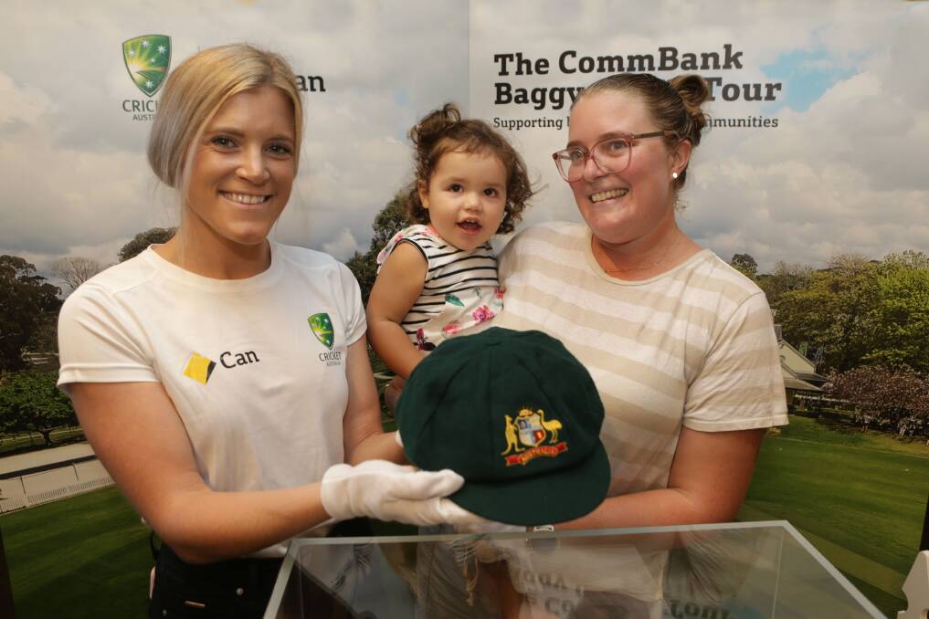 Special: Zayla with mum, Alana, and the cap. Picture: John Veage