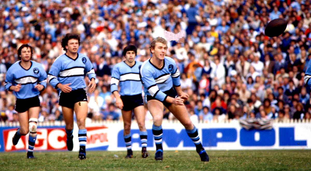 Steve Rogers passes the ball during the 1978 grand final replay between Cronulla and Manly. Picture: Rick Stevens