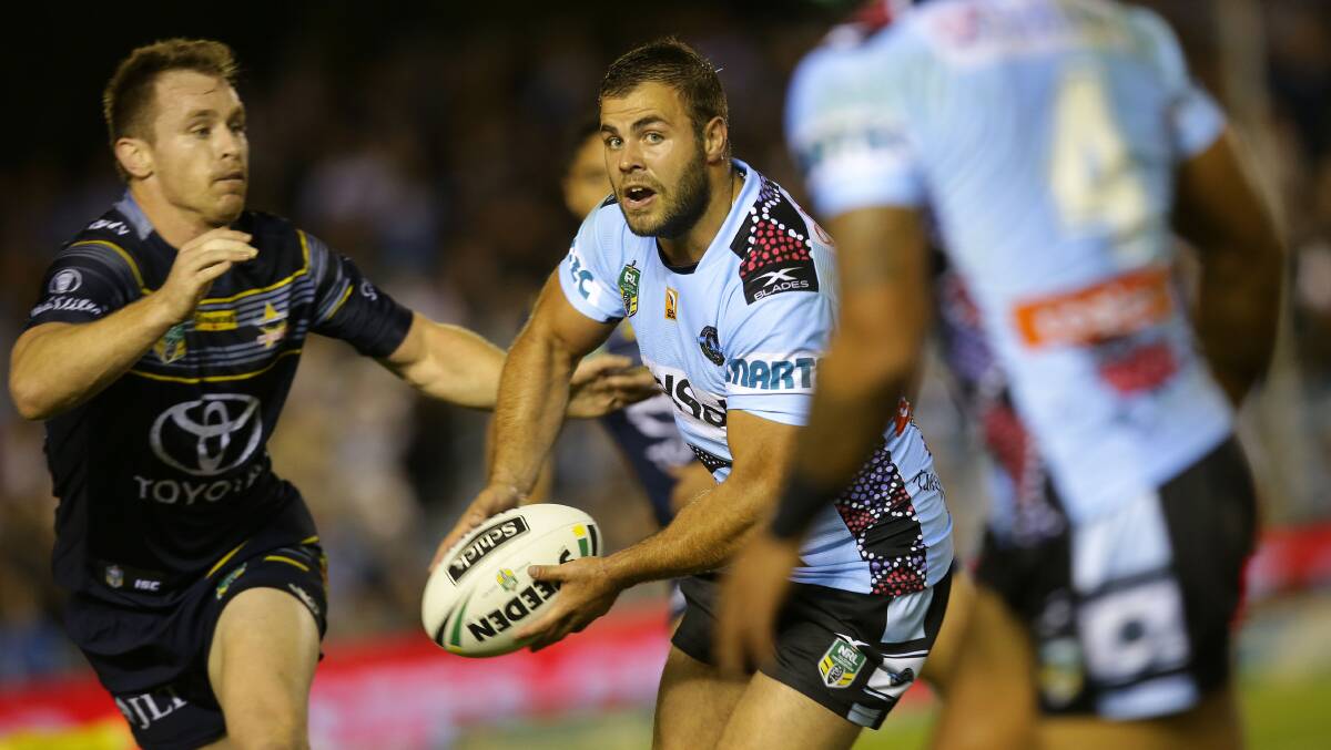 Winners: Sharks forward Wade Graham takes on the North Queensland line. Picture: John Veage