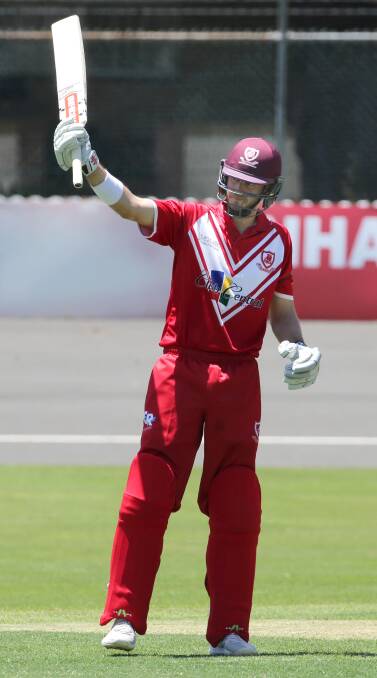 Standing up: St George batsman Kurtis Patterson celebrates reaching his century against Western Suburbs at Hurstville on Saturday. Picture: John Veage