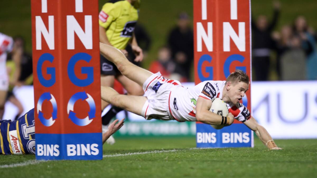 Late show: Dragons fullback Matt Dufty swoops to win the game for St George Illawarra. Picture: Adam McLean
